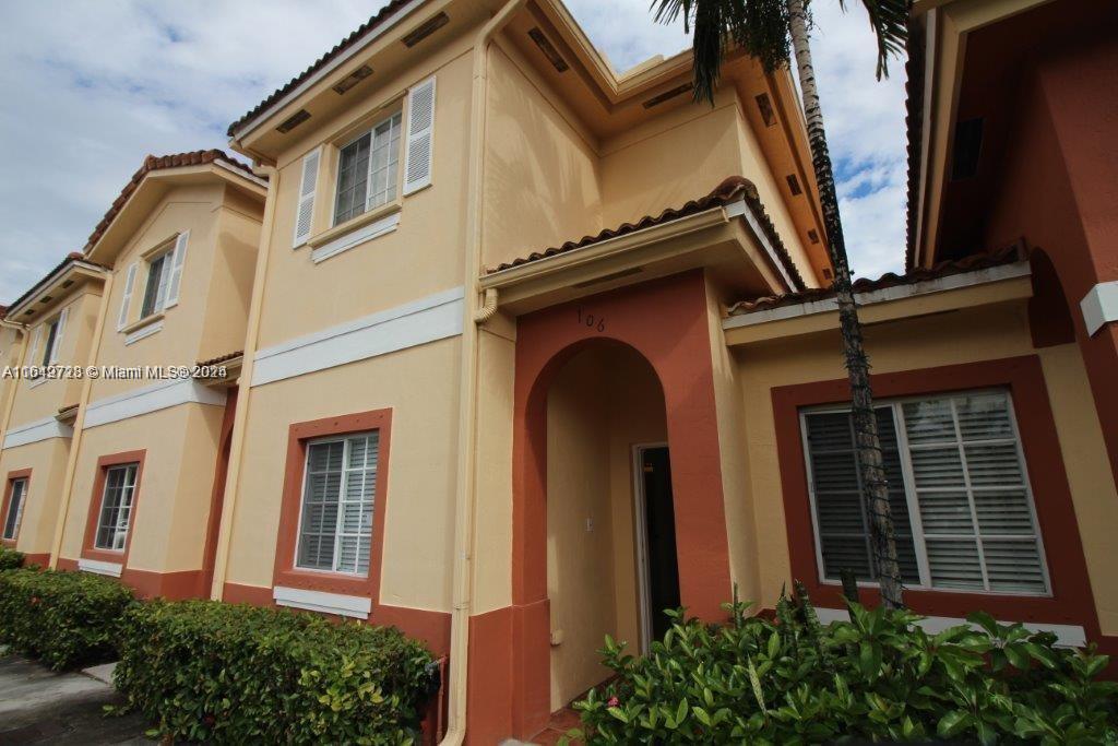 a front view of a house with balcony