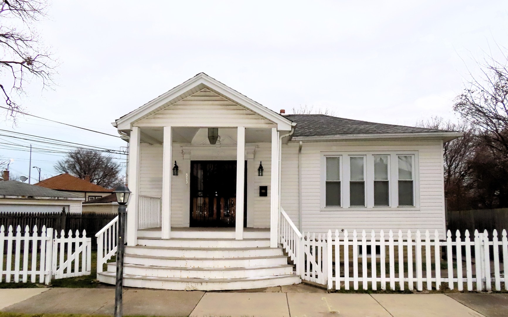 a front view of a house with a porch