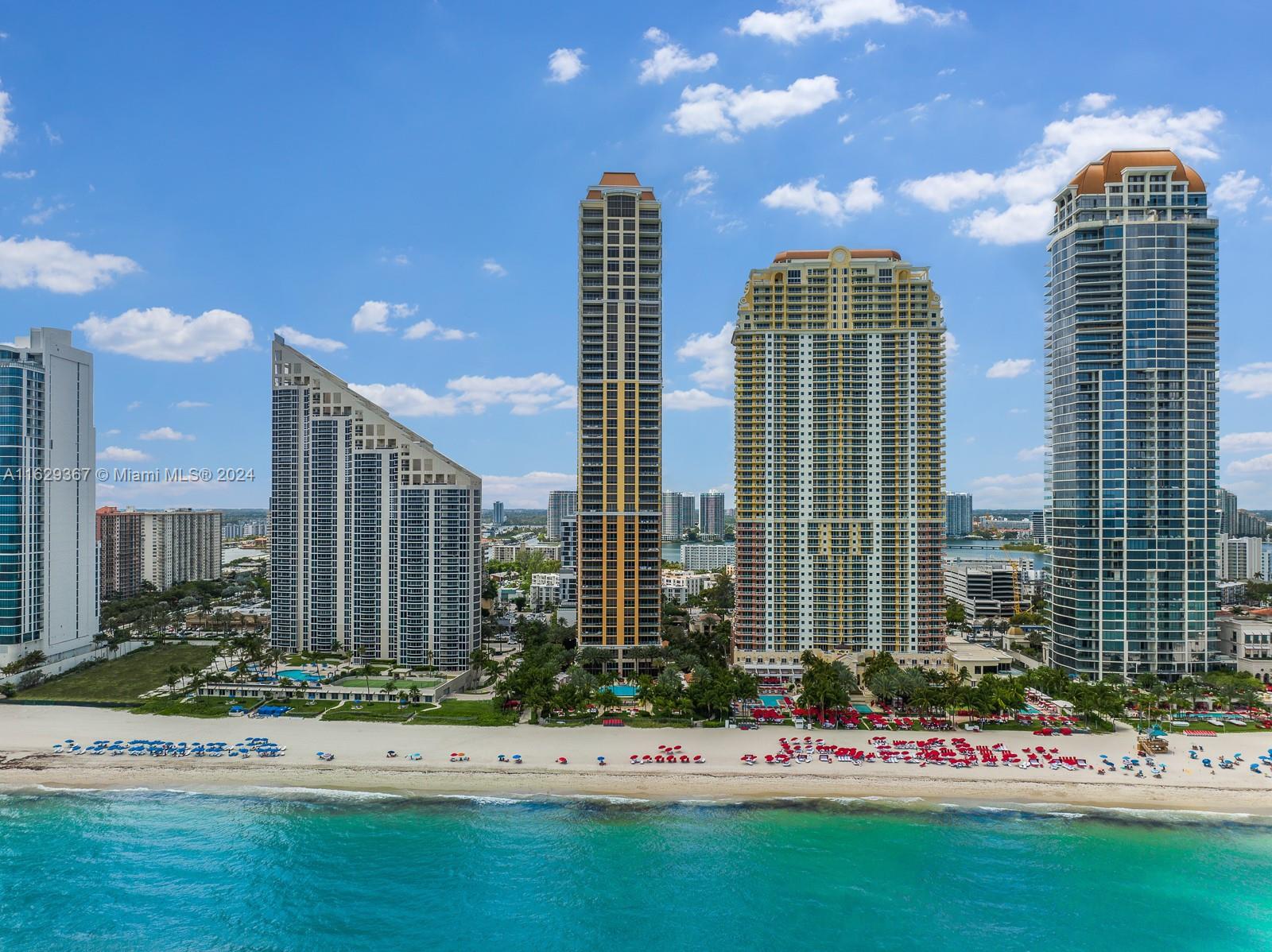 a view of a city with tall buildings