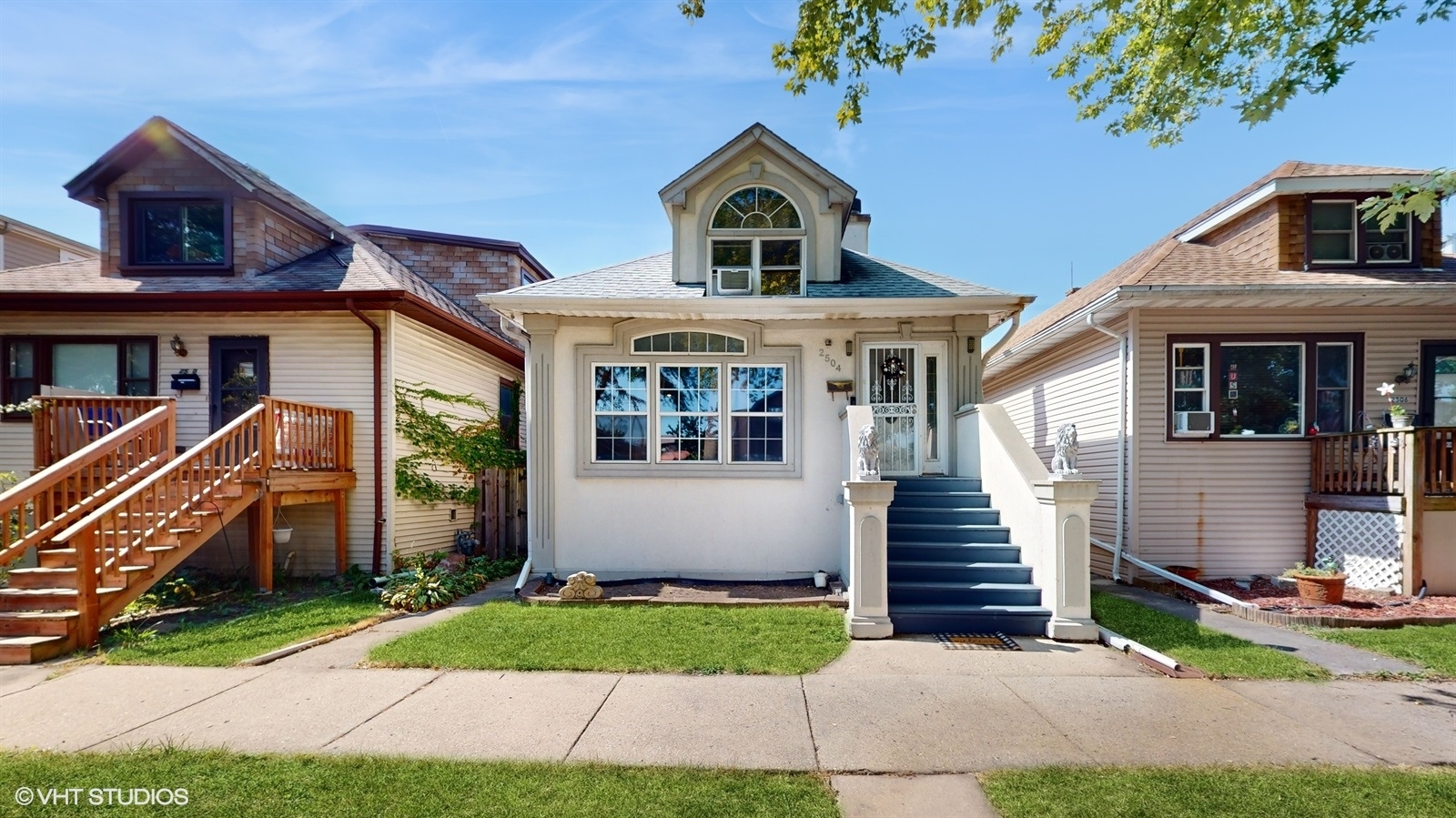 a front view of house with yard