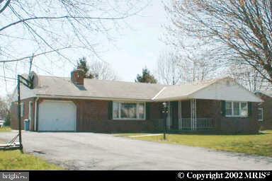 a view of house with outdoor space