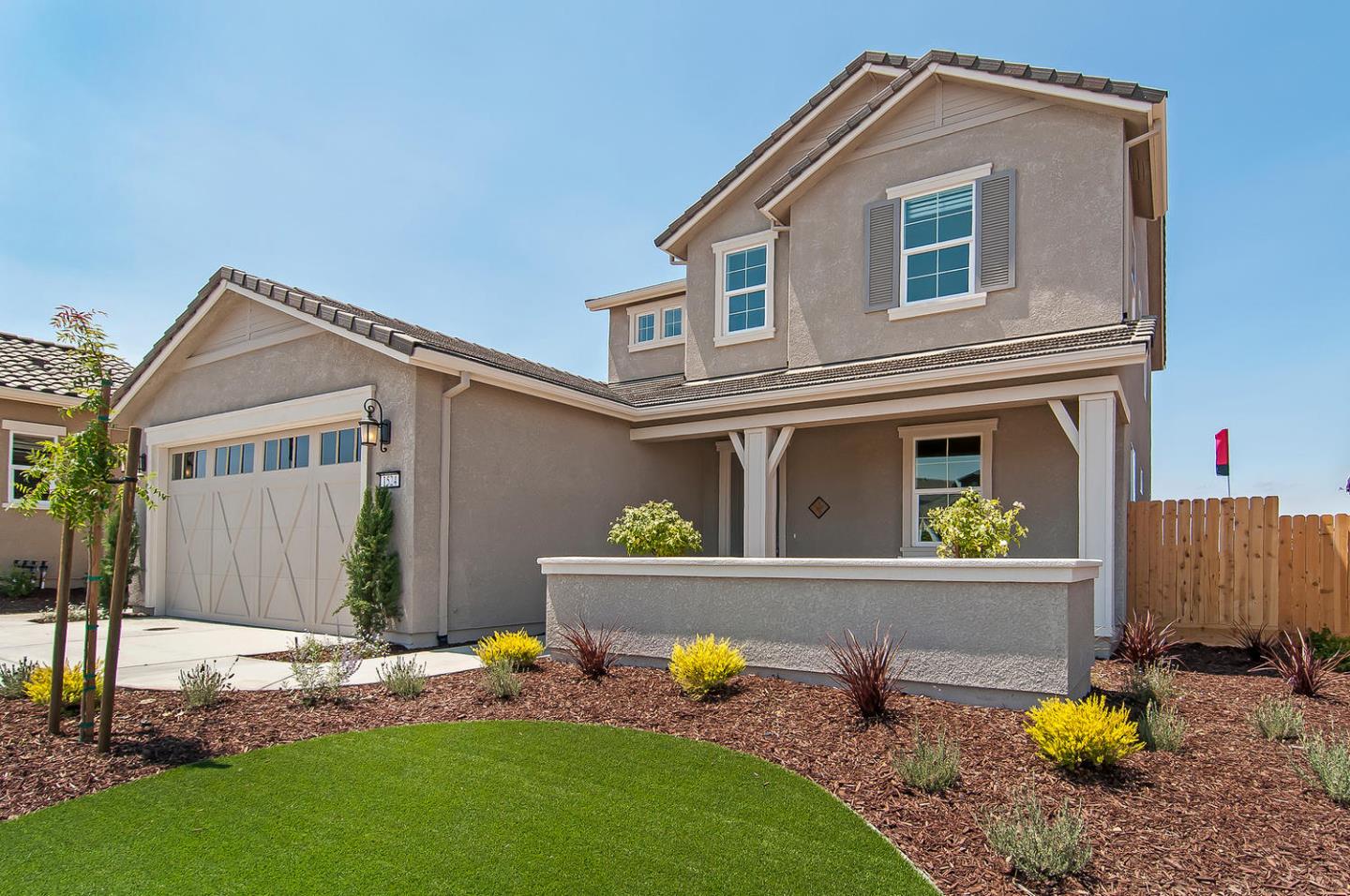 a front view of a house with patio