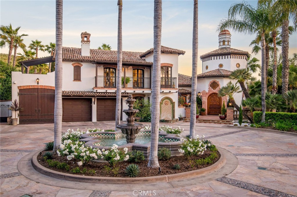 a front view of a building with garden