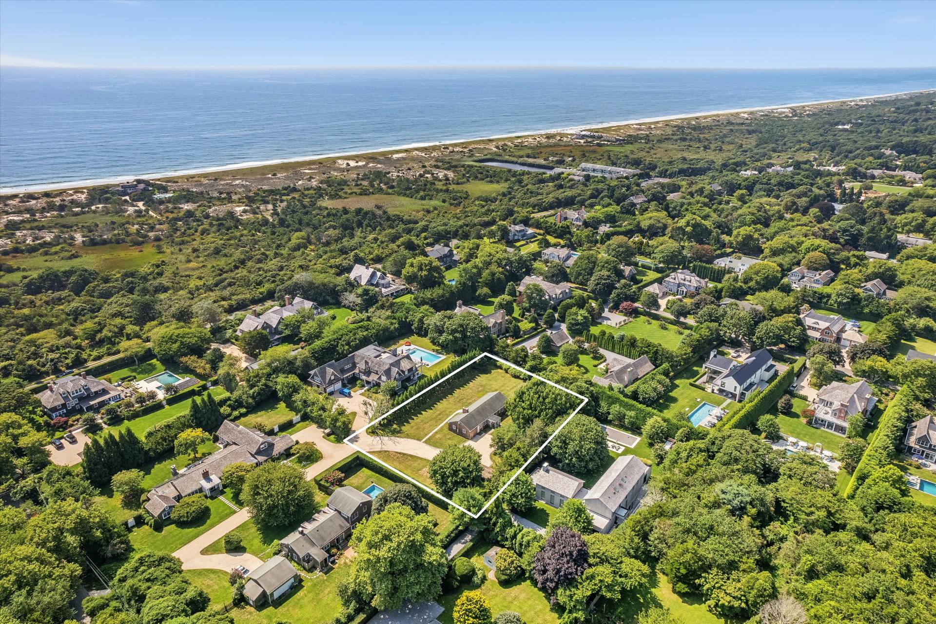 an aerial view of residential building with parking space