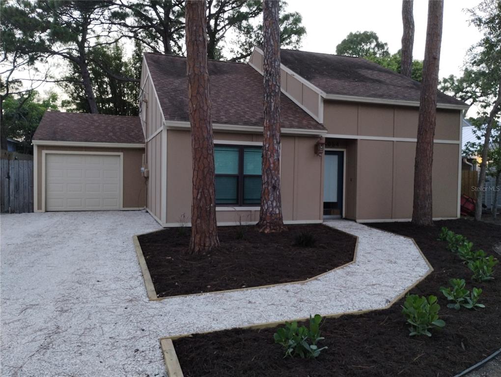 a front view of a house with entertaining space