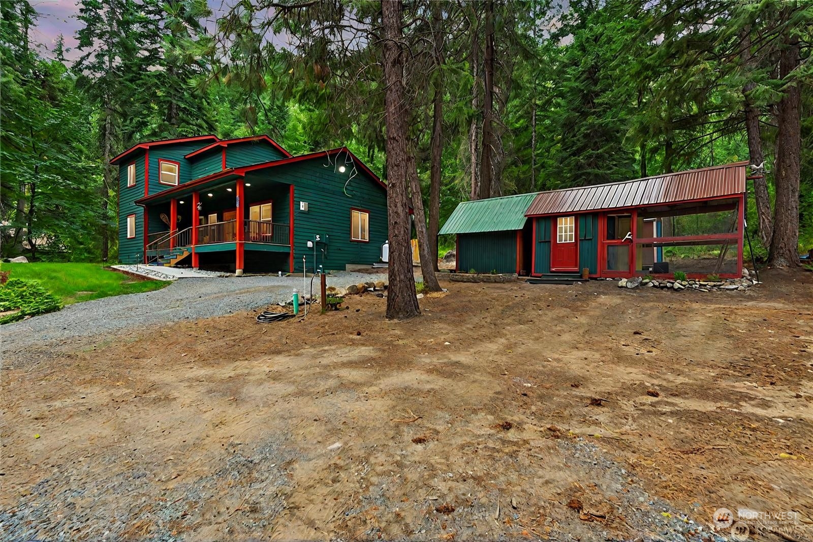 a view of a house with a yard porch and sitting area