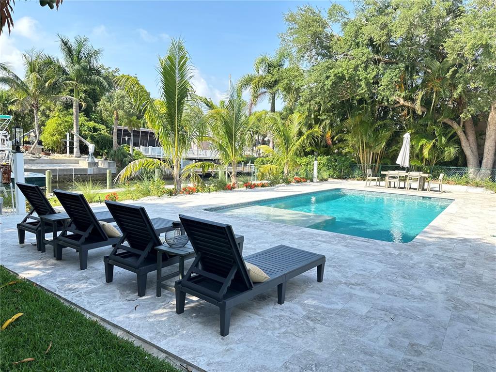 a view of a outdoor sitting area with chairs