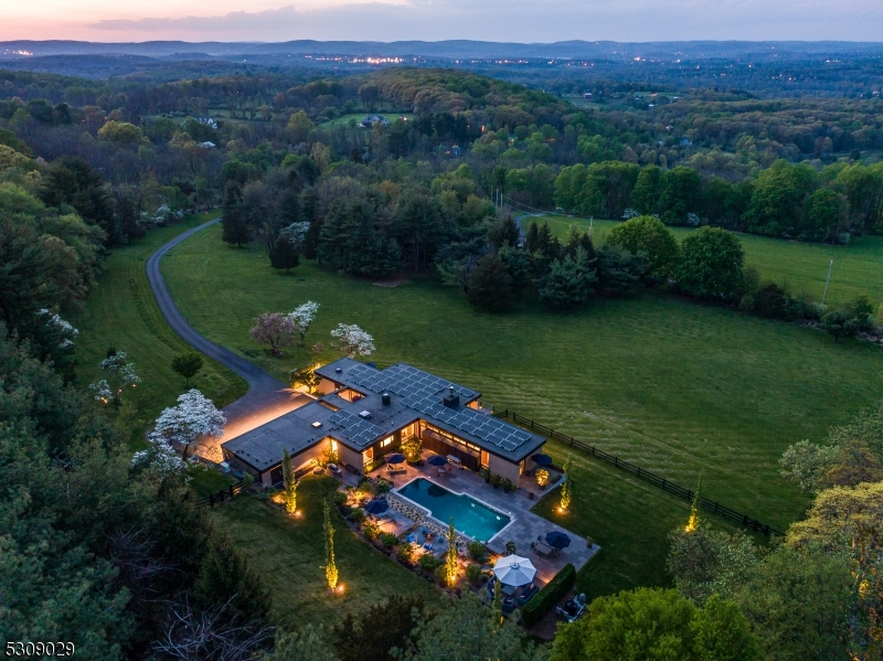 an aerial view of a house a garden