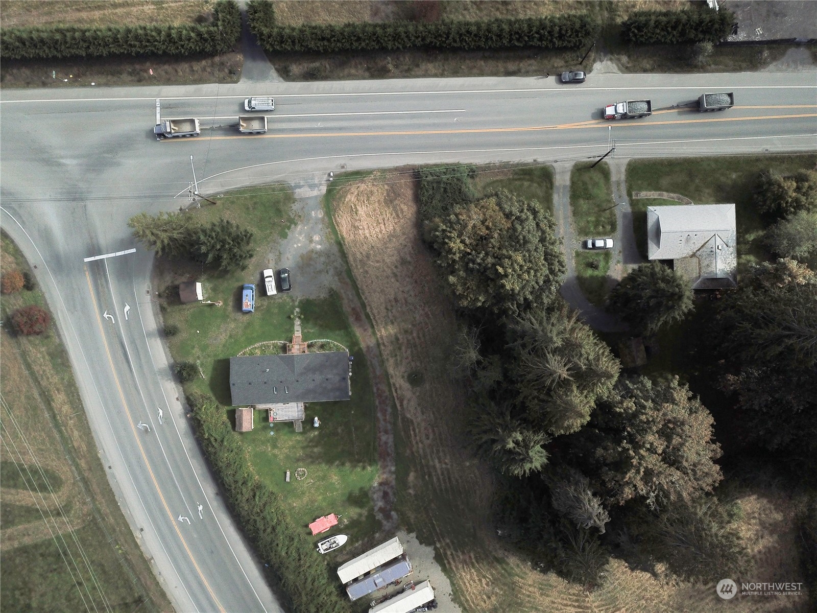 an aerial view of a house with outdoor space