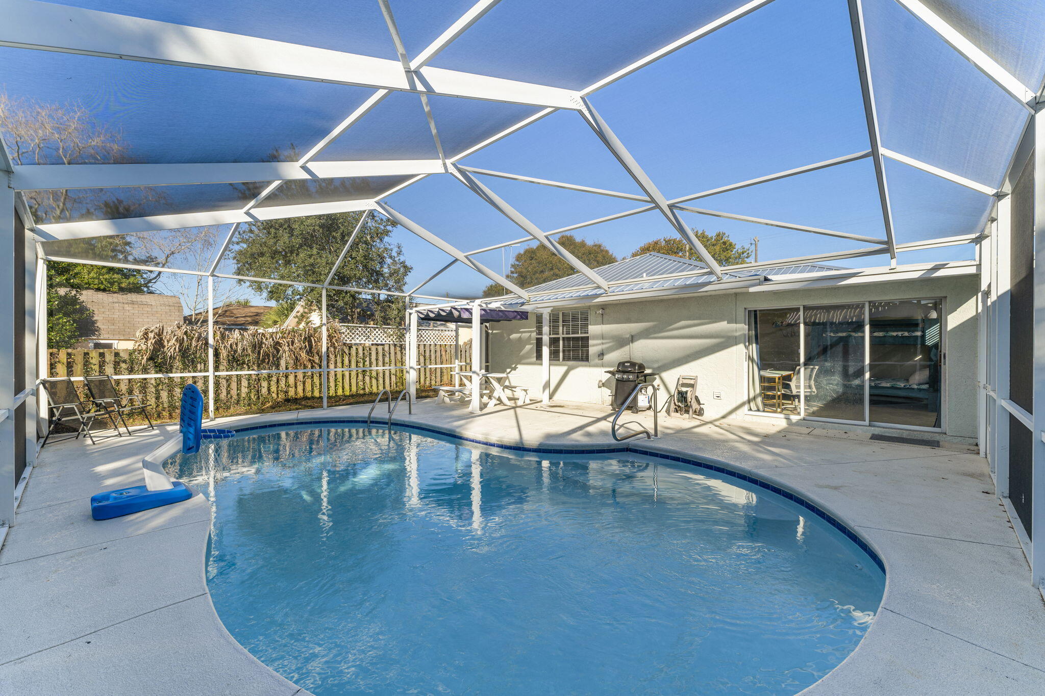 an outdoor view of a swimming pool