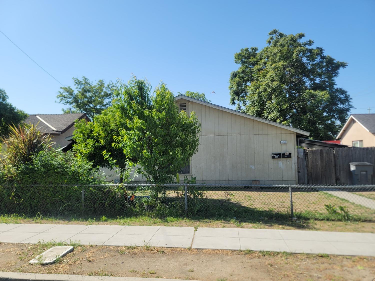 a front view of a house having yard