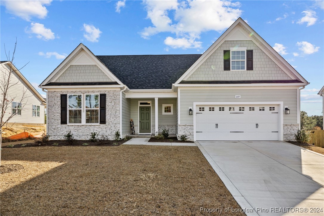 a front view of a house with a outdoor space