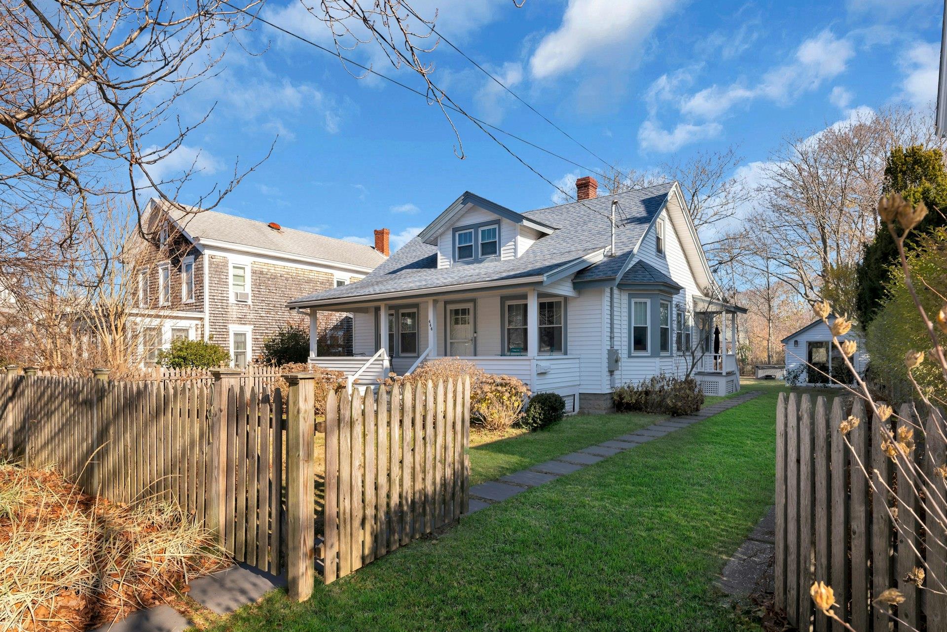 Bungalow-style house featuring a front yard