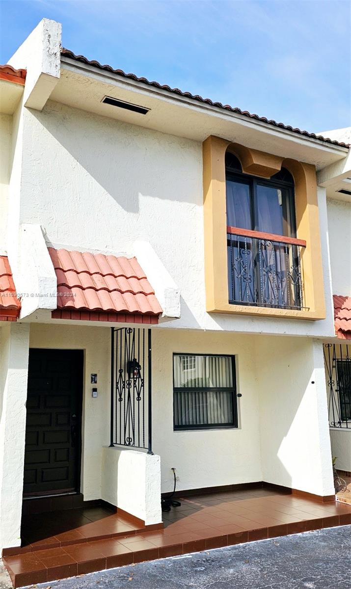 a front view of a house with entryway