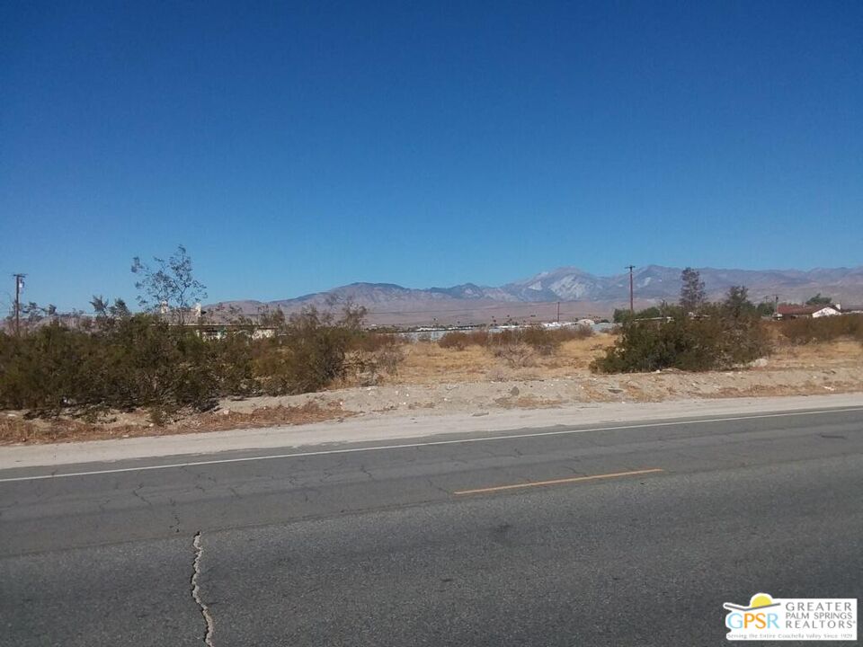 a view of a road with a mountain