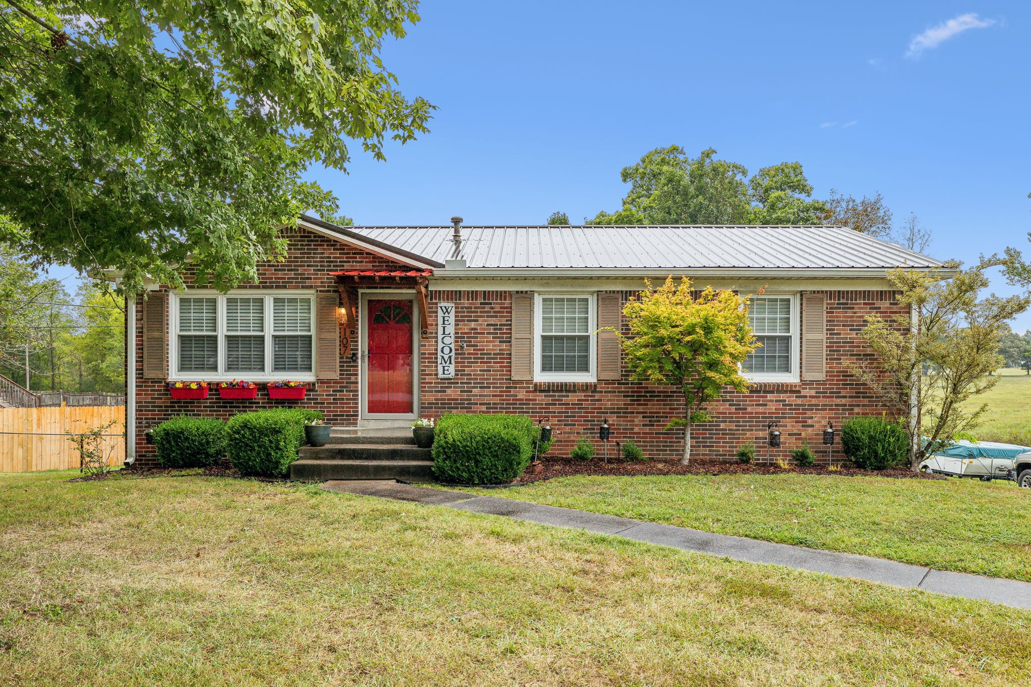 front view of a house with a yard