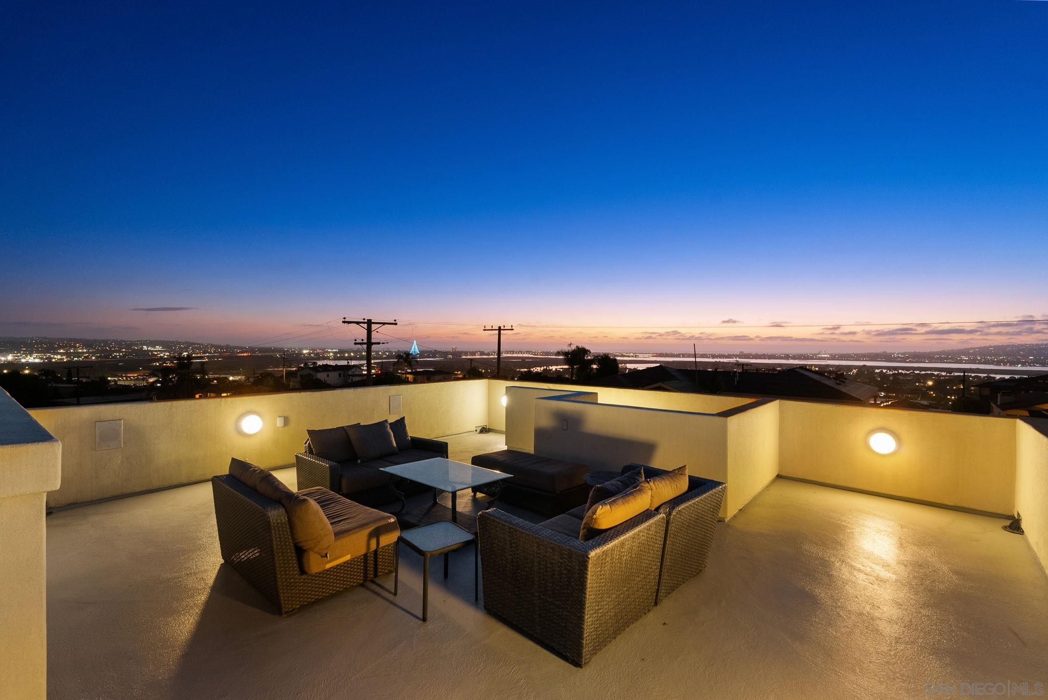 a view of a terrace with chairs