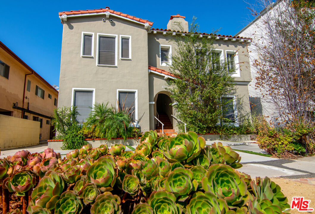 a front view of a multi story residential apartment building