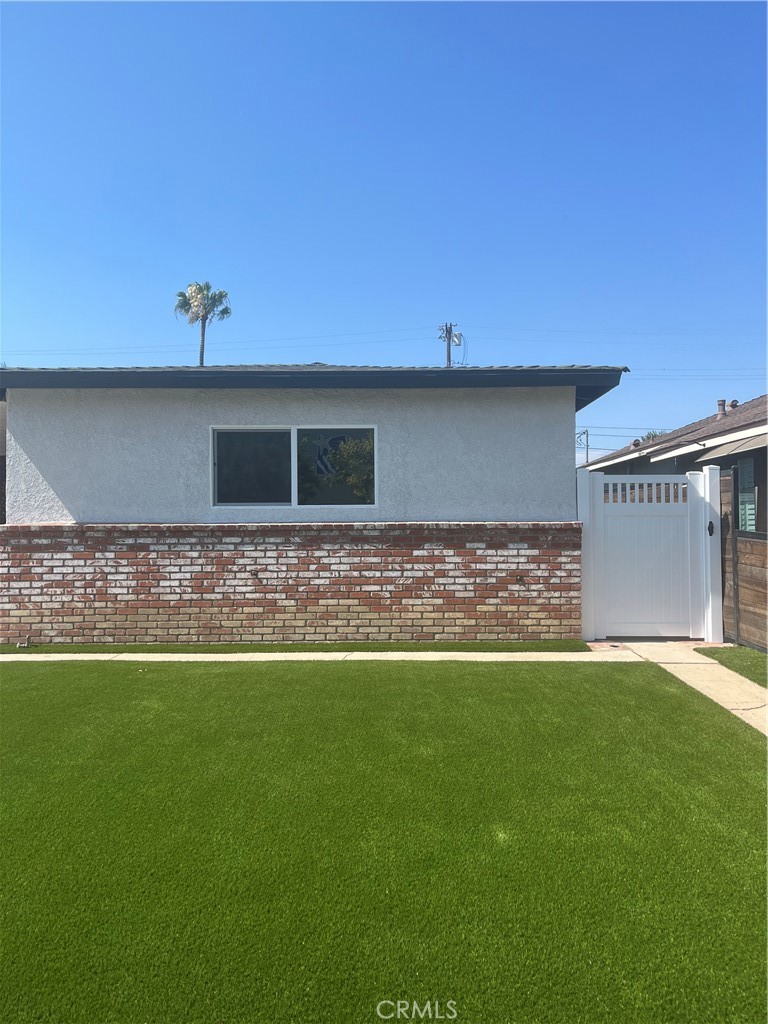 a view of a backyard with a garden