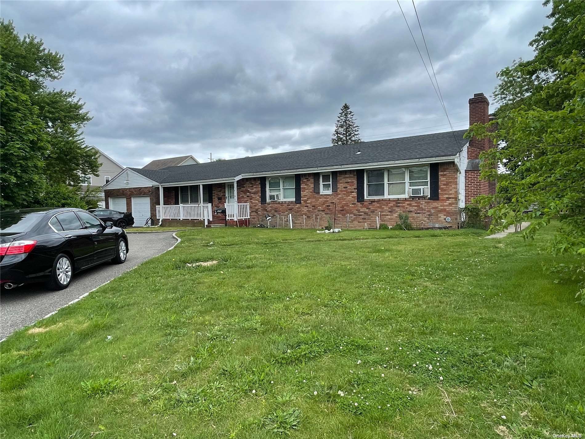 a view of a house with a garden