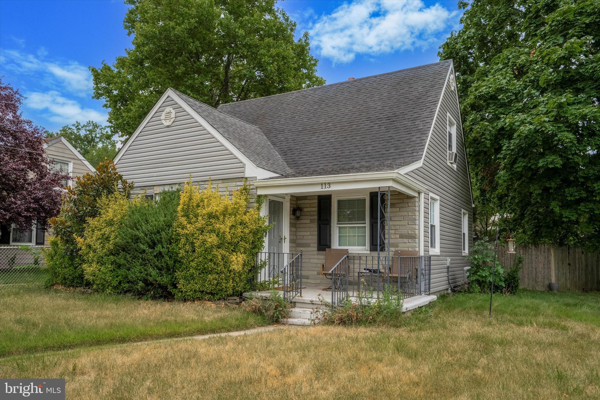 front view of house with a yard