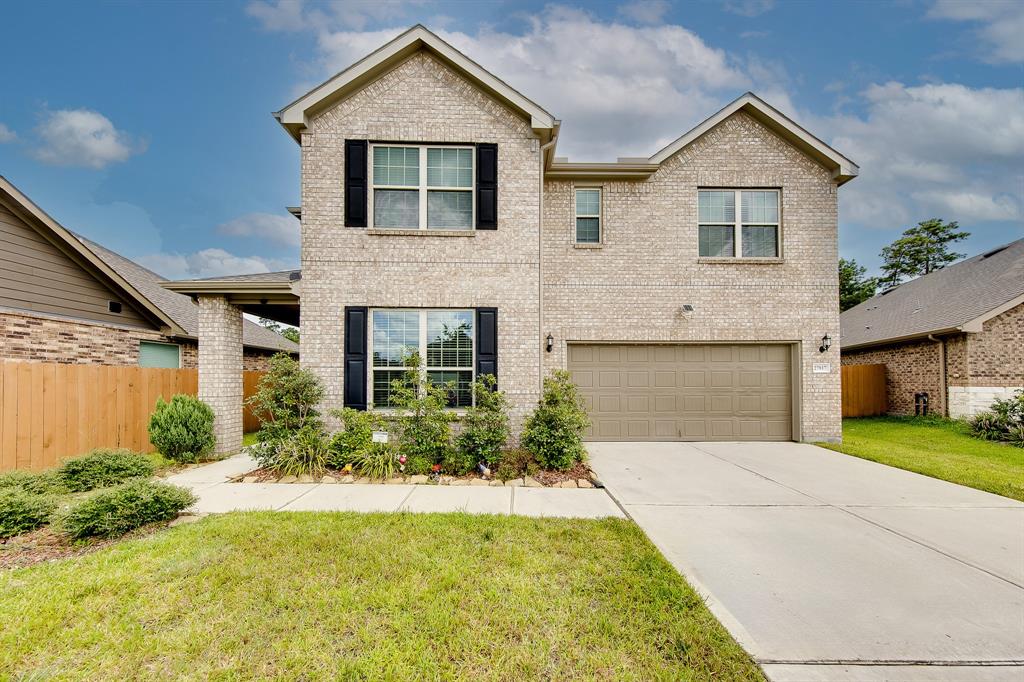 This beautiful two-story home boasts a striking brick facade that adds a touch of classic elegance and durability. The charming exterior sets the tone for the welcoming atmosphere inside, making it an inviting retreat for you and your family. With ample space across two levels, this home is perfect for both comfortable living and entertaining.