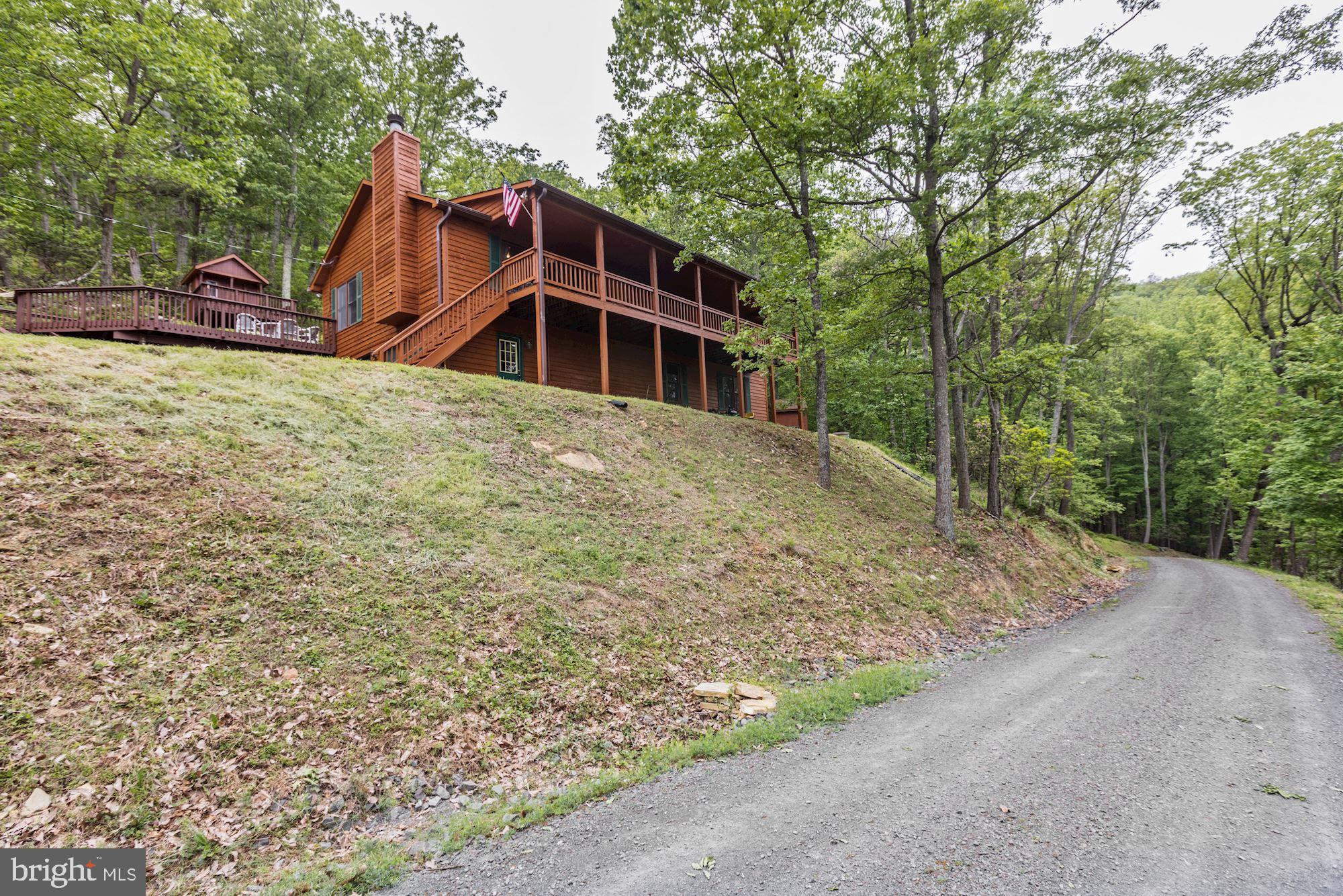 a house with trees in front of it