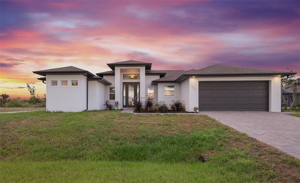 front view of a house with a yard