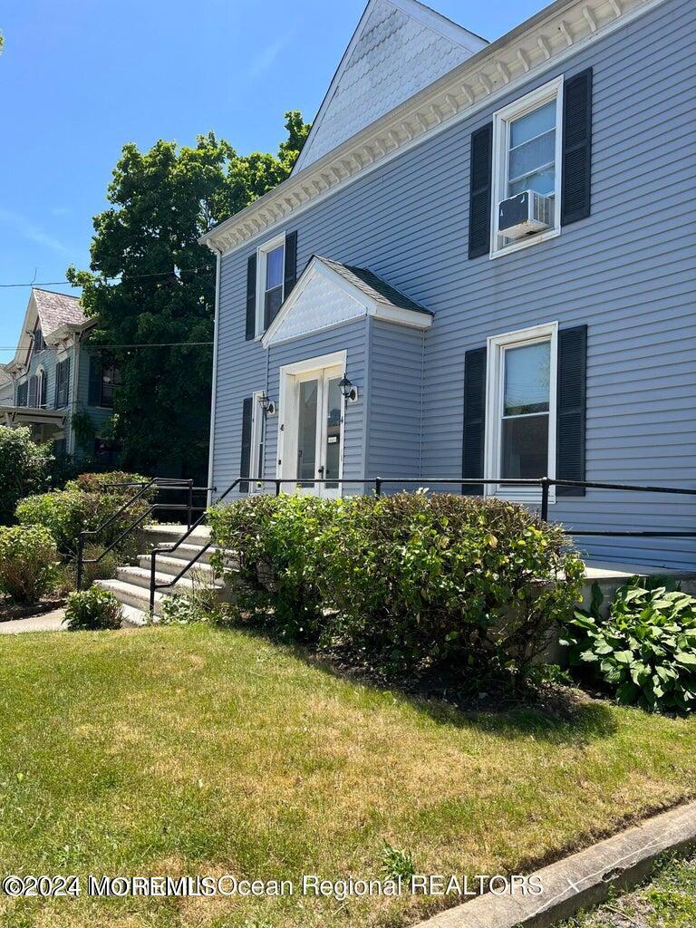 a view of a house with a garden