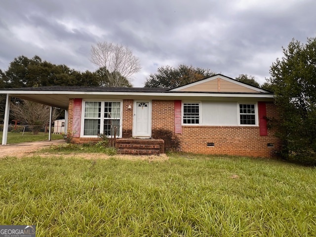 front view of a house with a yard