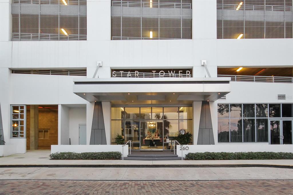 a front view of a building with glass windows