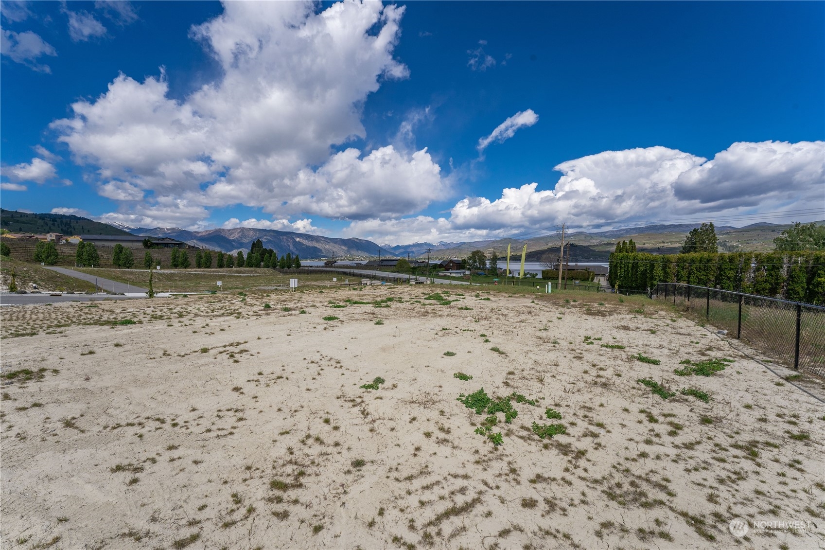 a view of a lake with a big yard