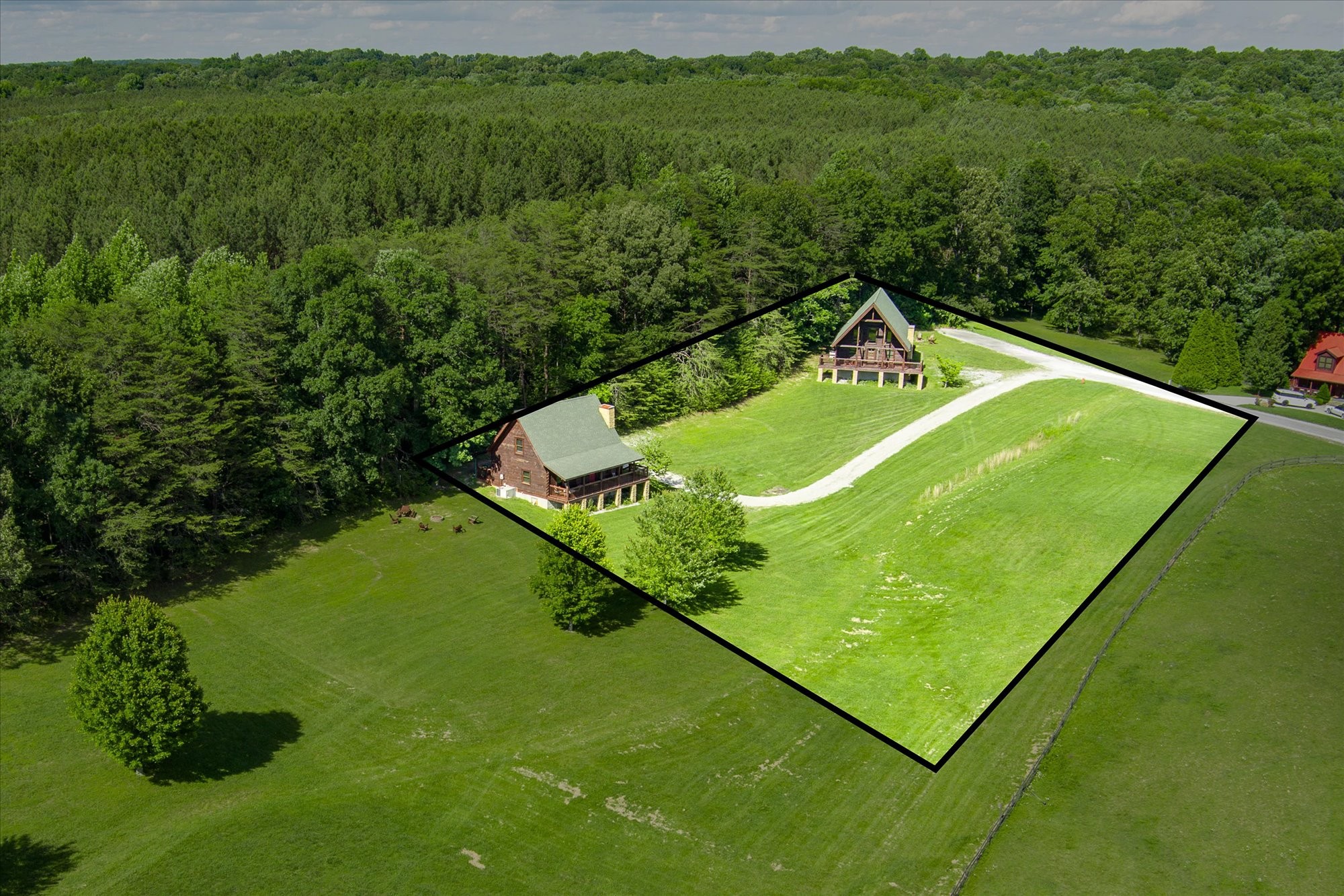 a view of a back yard of the green field