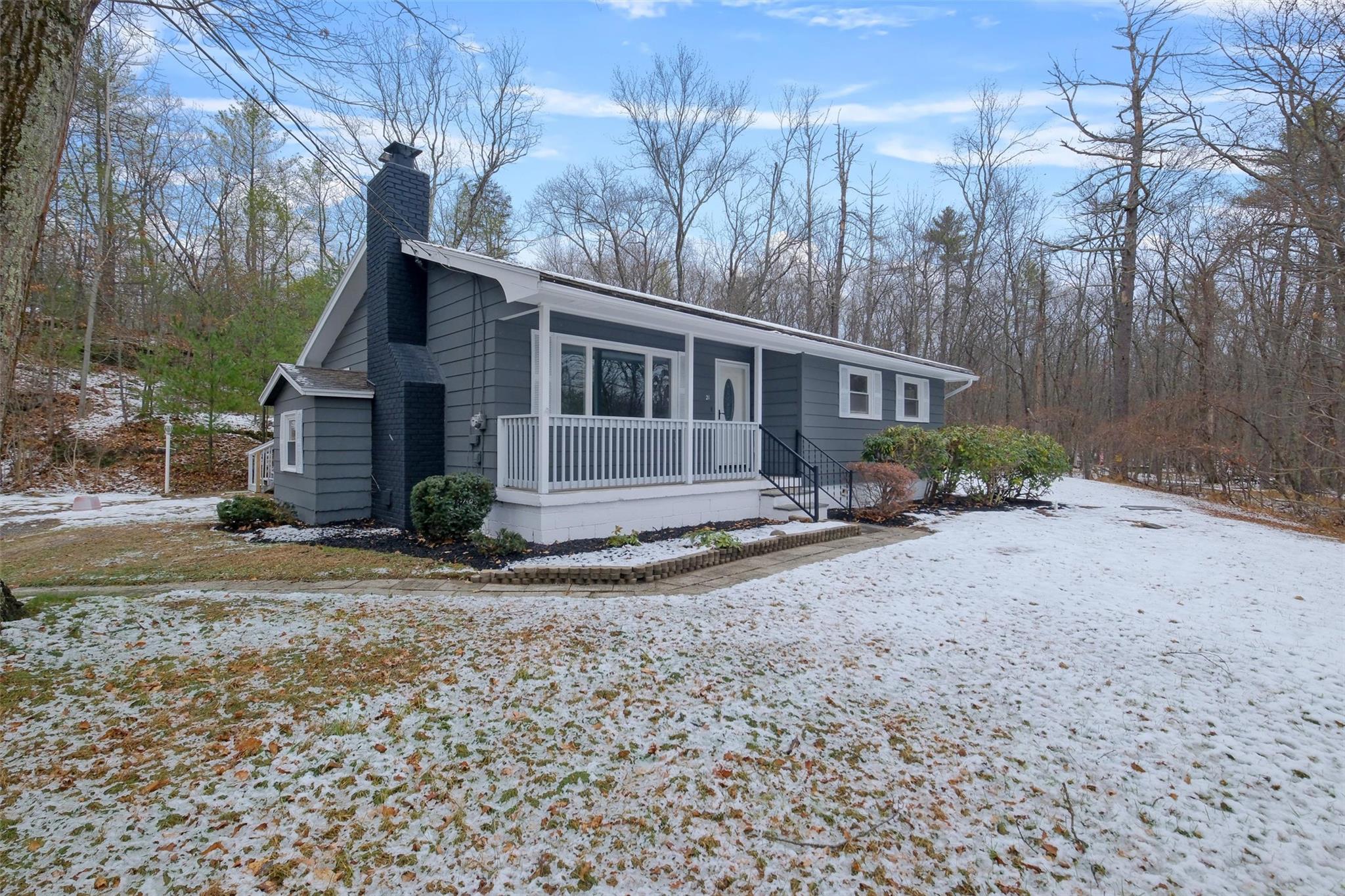 View of front of home featuring covered porch