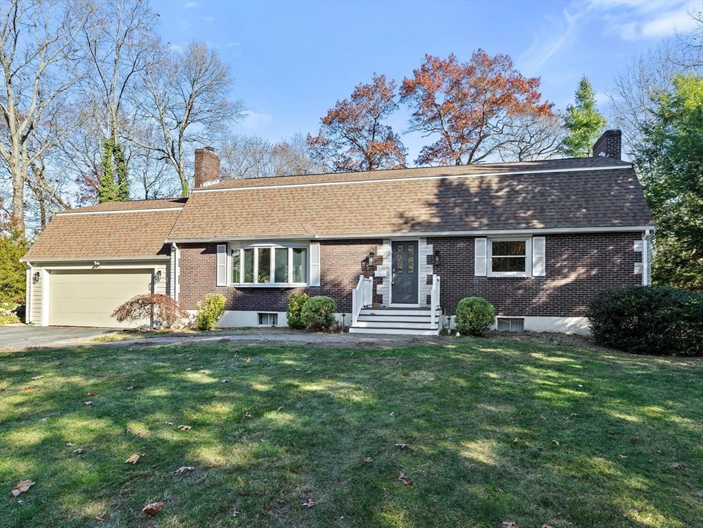 front view of a house with a big yard