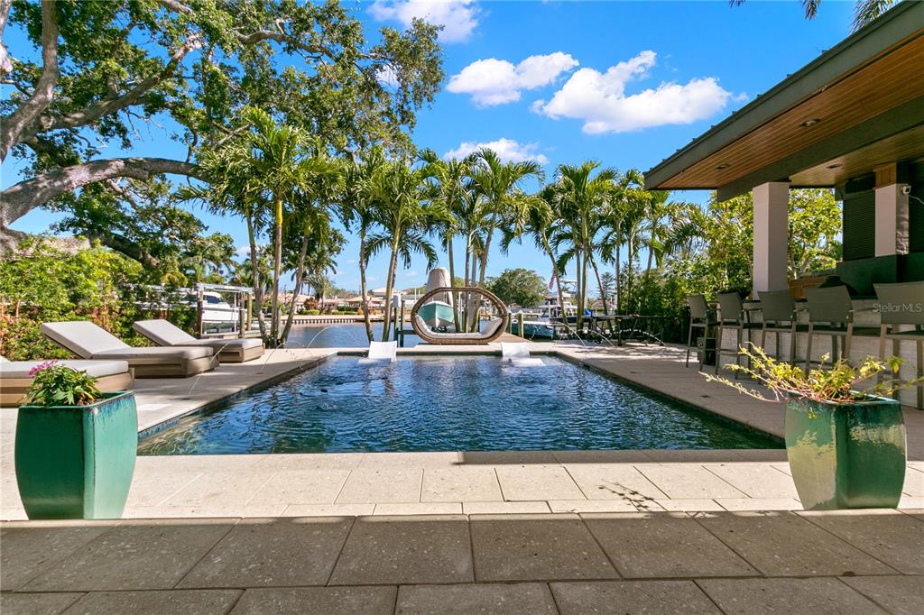 a view of a swimming pool with a patio