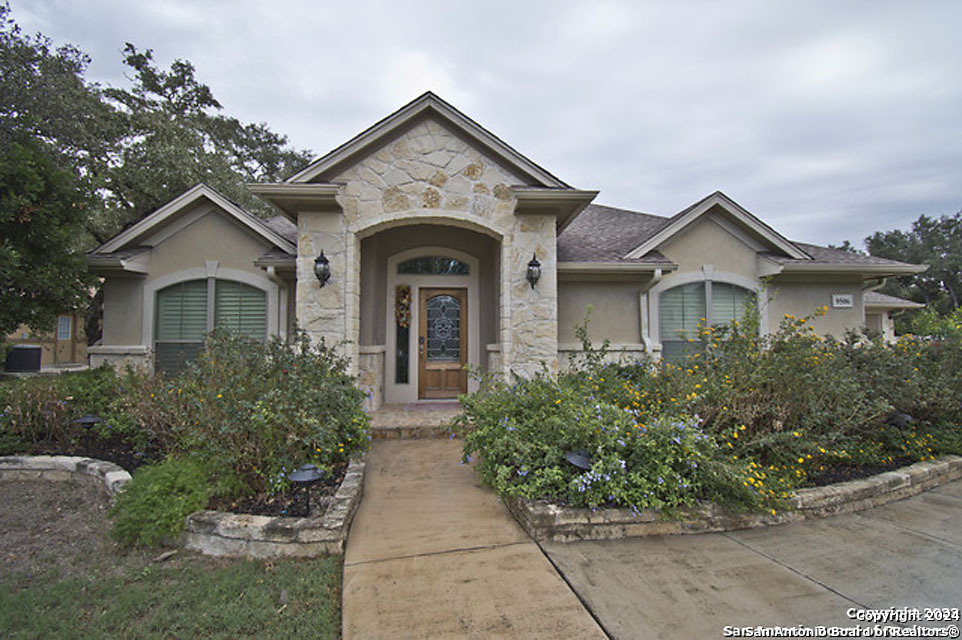 front view of a house with a yard