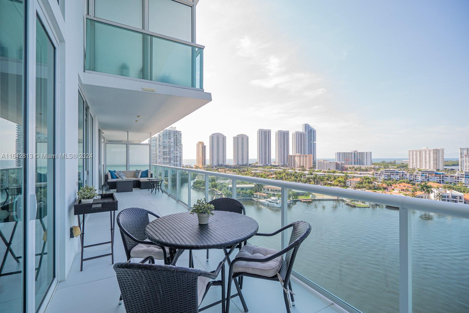 a patio with a table and chairs and a table