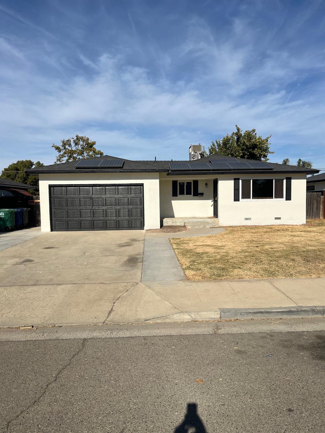 a front view of house with yard