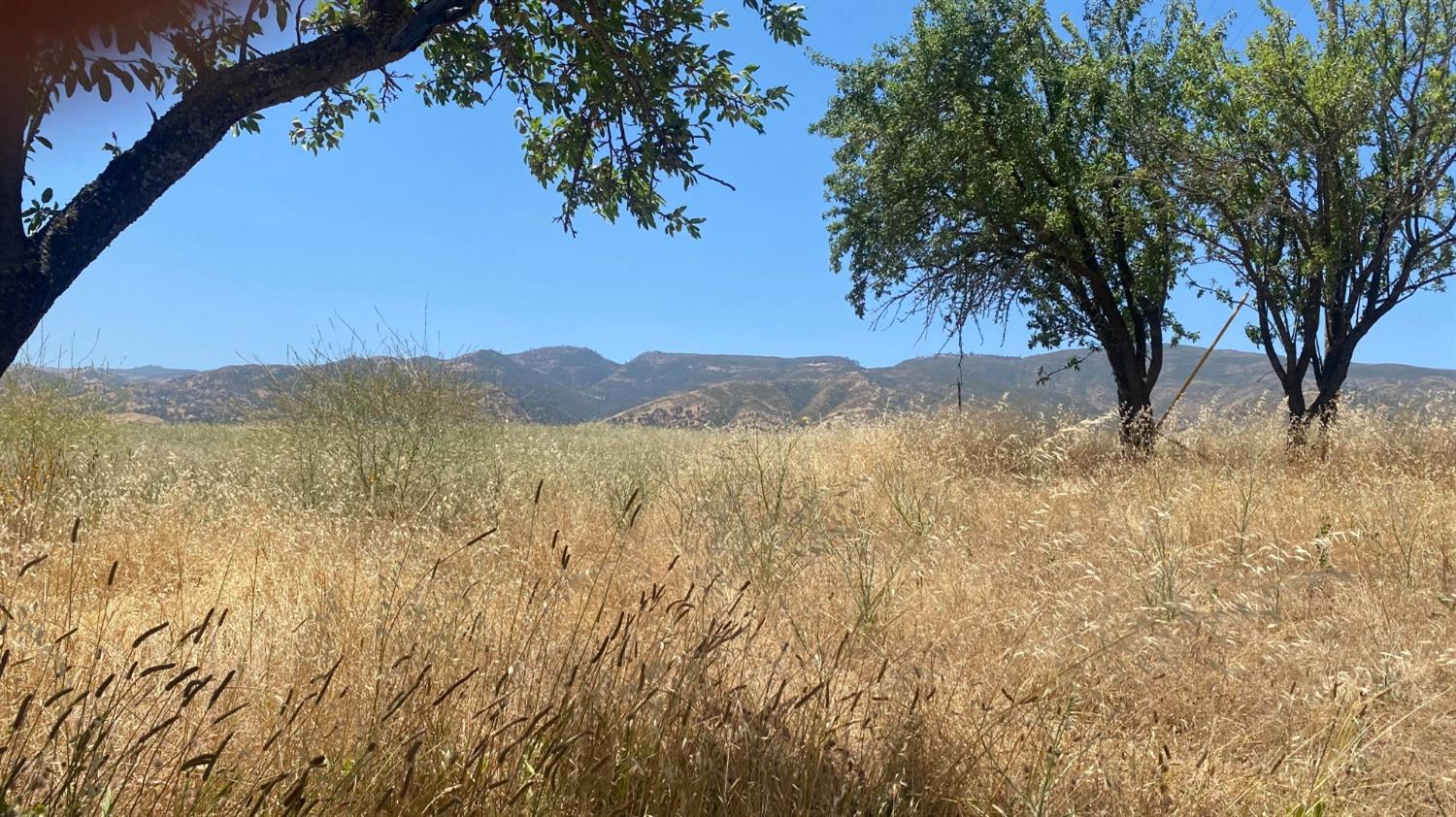 a view of mountain view with mountains in the background