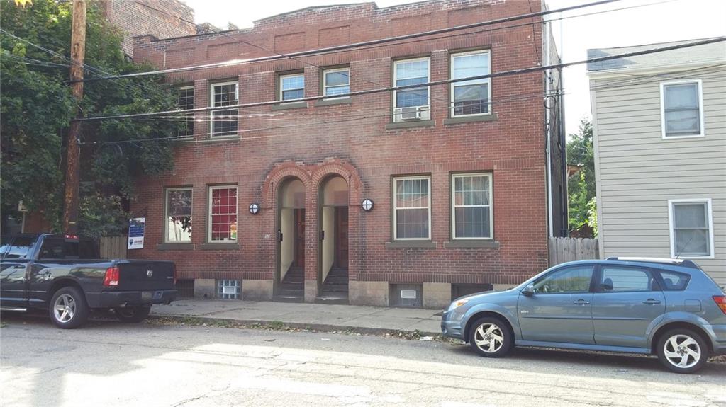 a car parked in front of a building