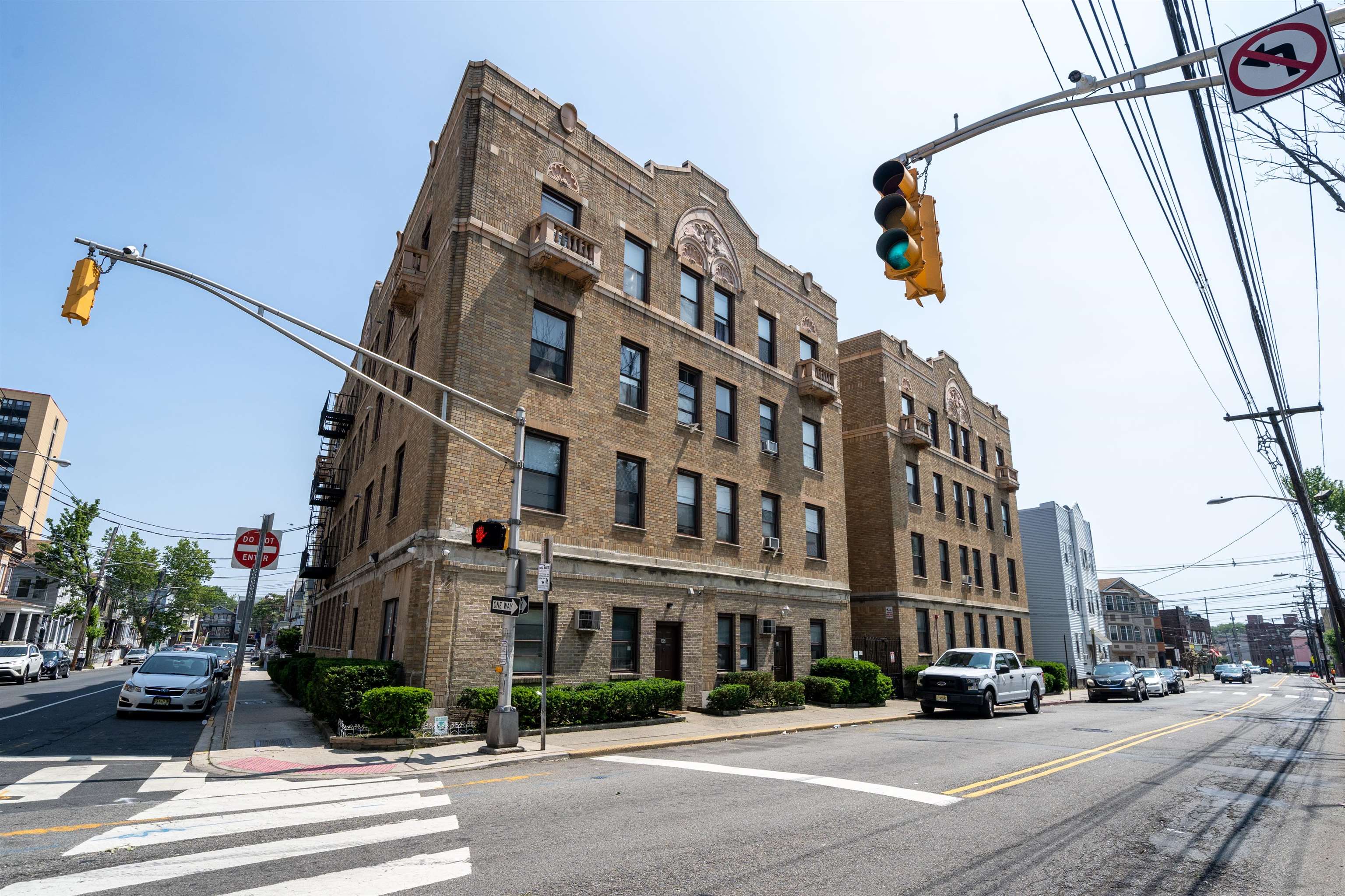 a view of a building with a street