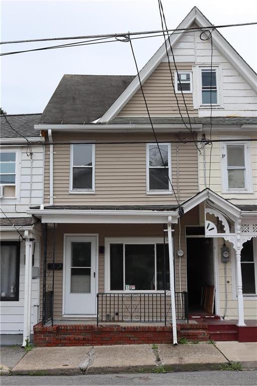 a view of a house with a balcony