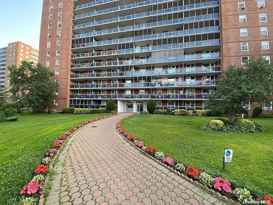 a view of a building with a garden