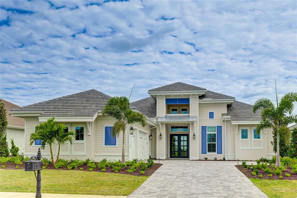 front view of a house with a yard