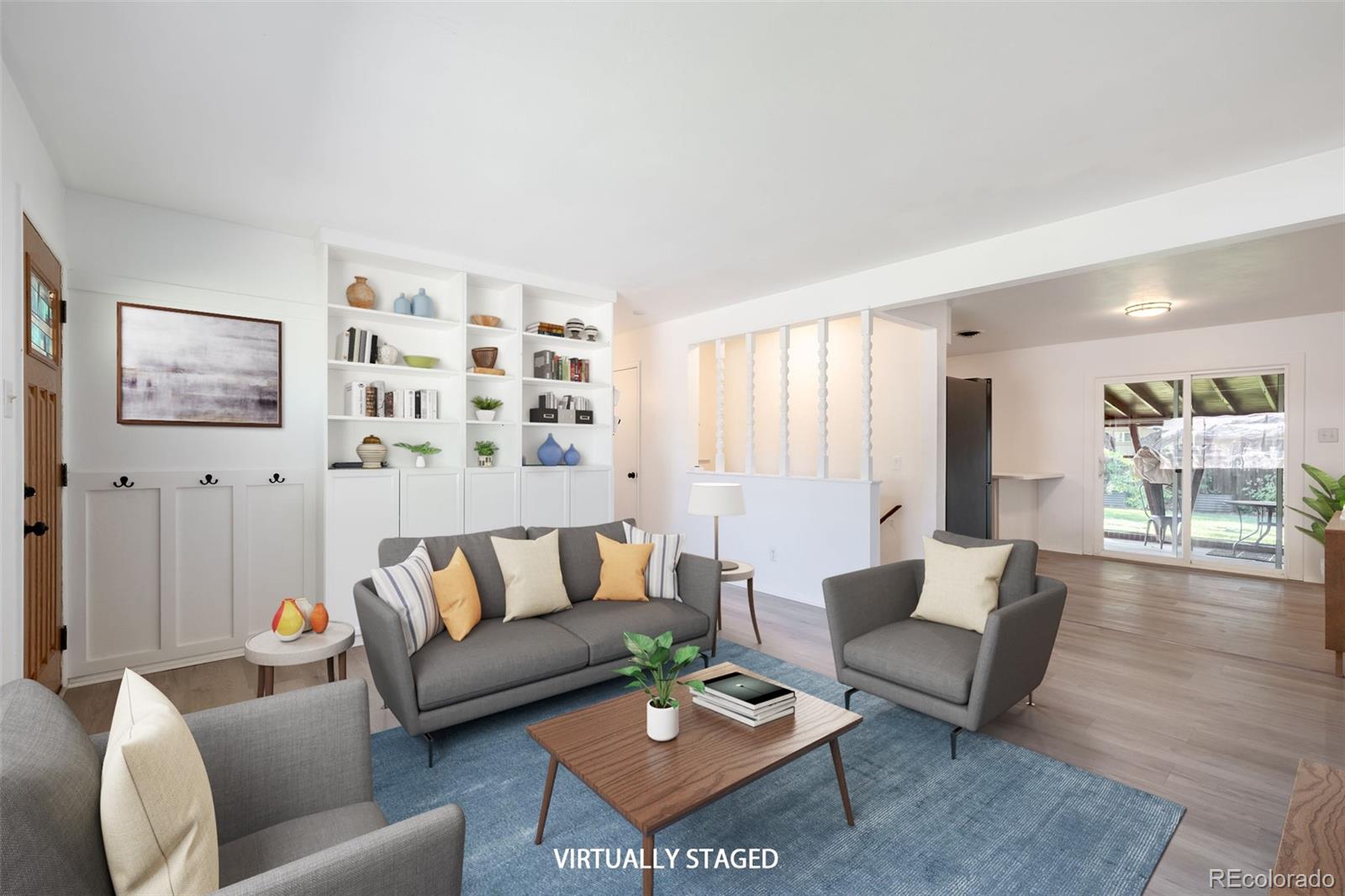 a living room with furniture and a rug