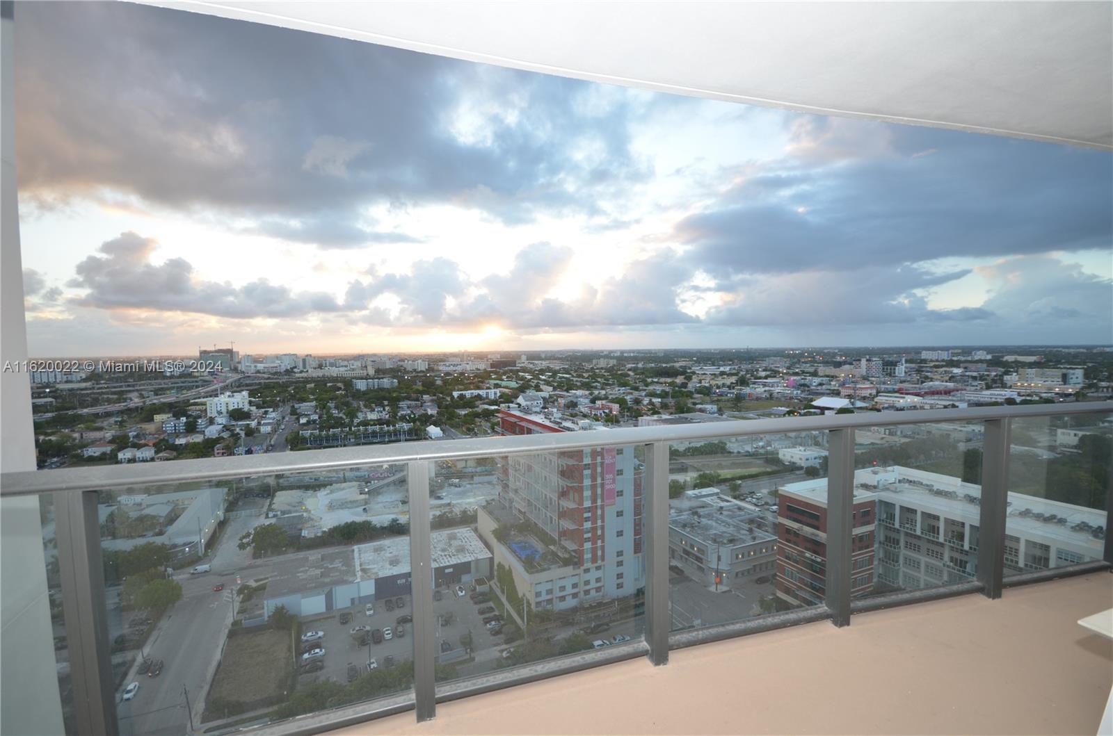 a view of a city from a balcony