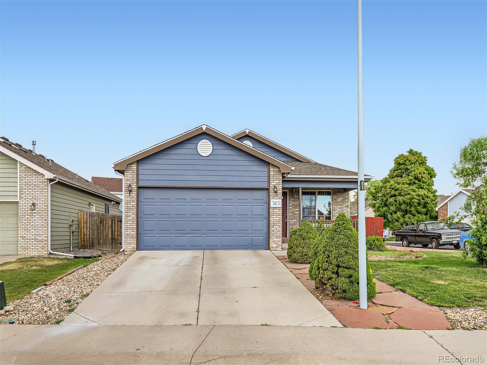 a front view of house with yard