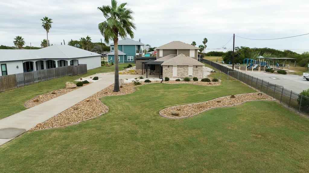 a view of a house with a big yard