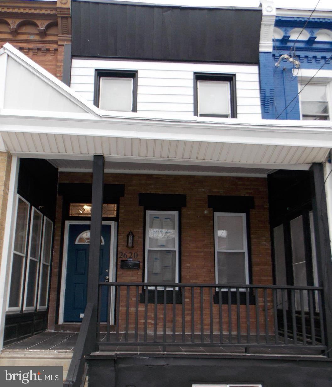 a view of building with entrance gate